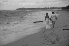 Couple Walking a Beach Couple Walking a Beach