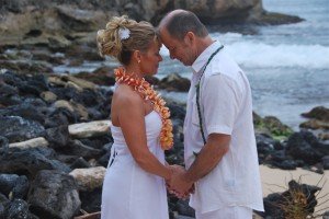 Single rainbow plumeria and ti leaf leis